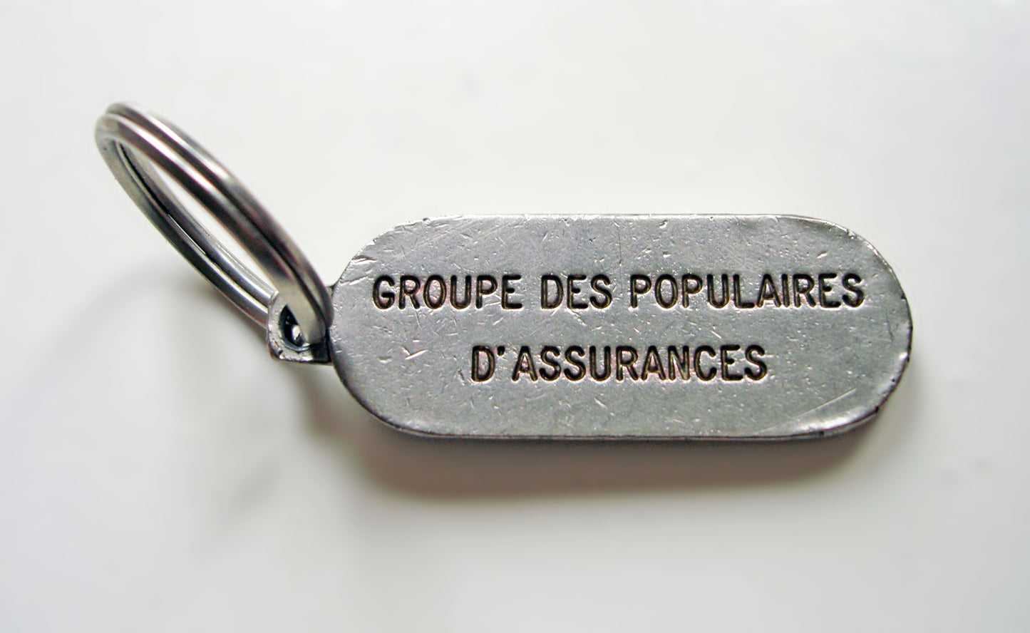 Porte clés "GPA - Groupe des Populaires d'Assurances" années 90