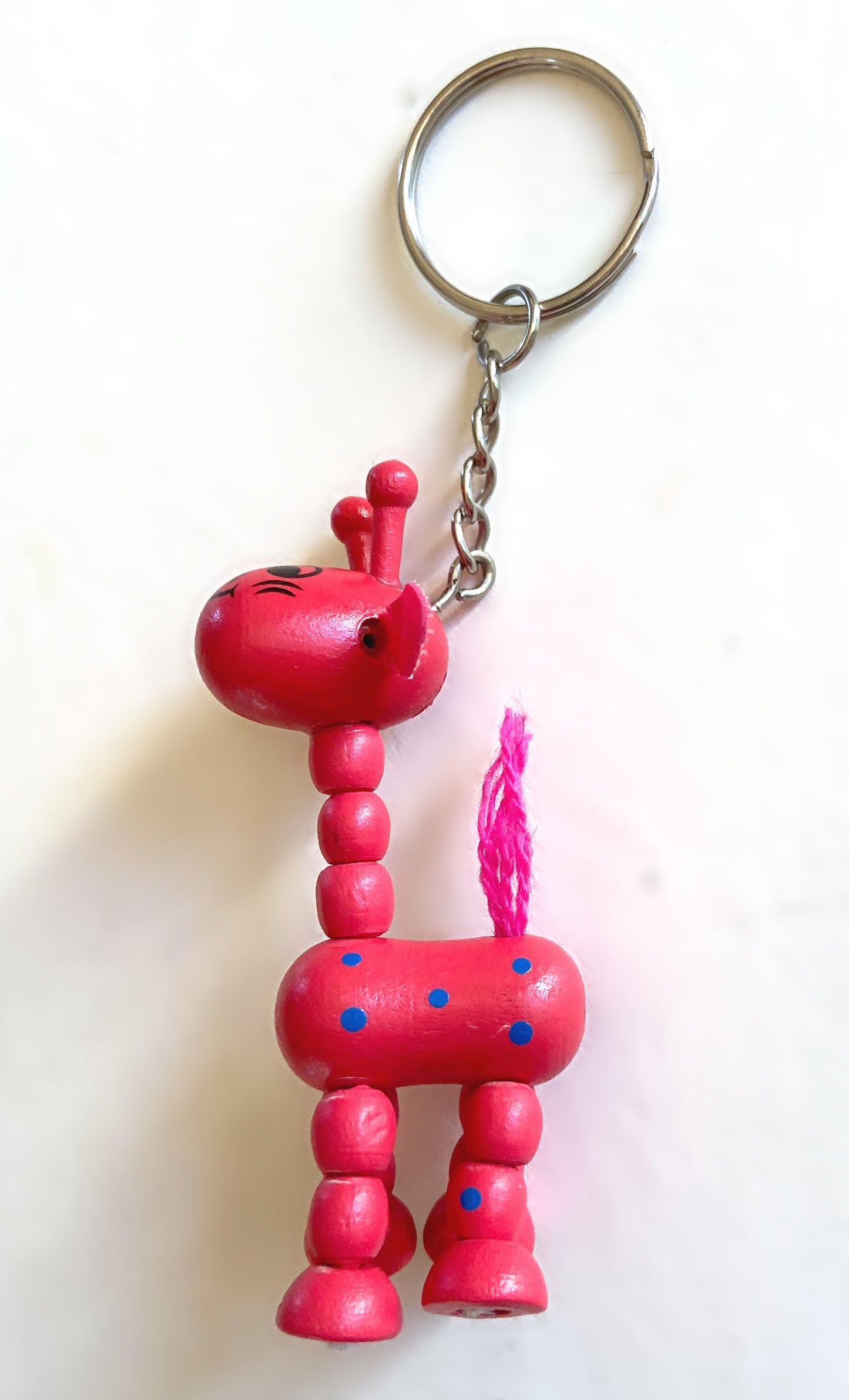 Porte clés artisanal « wakouwa » girafe articulée bois rose